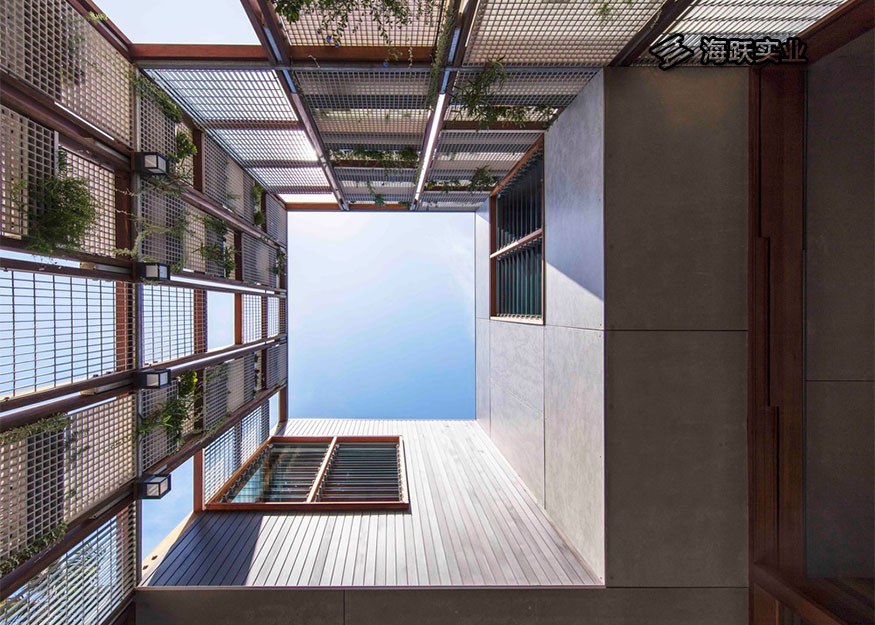 澳洲垂直花园铝格板幕墙背景设计
